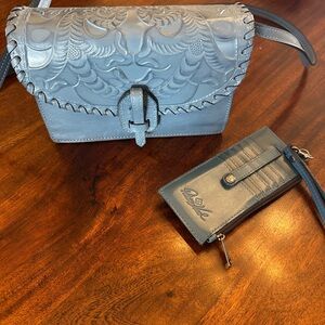 Patricia Nash Blue Embossed Crossbody Bag and Matching card holder wallet.